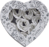 Heart-shaped box of soap leaves roses